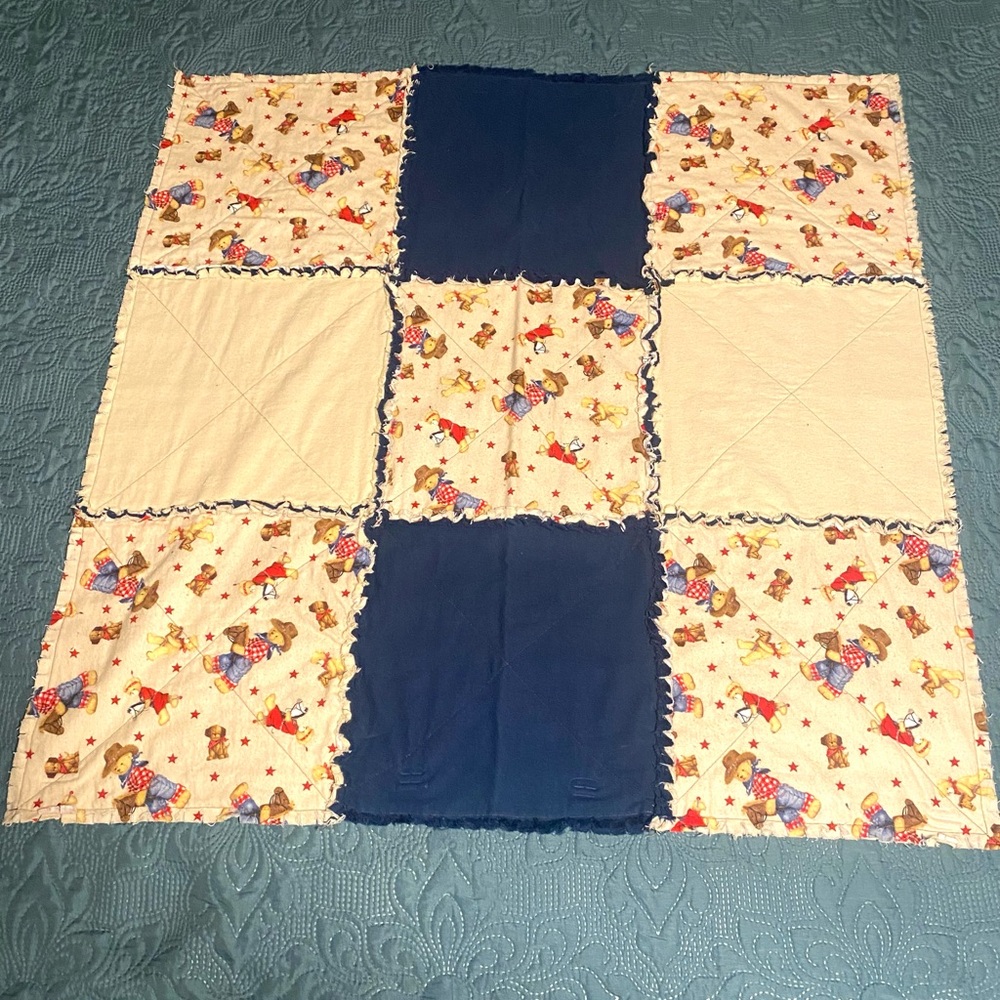 Patchwork Baby Quilt with Blue and Cream Accents